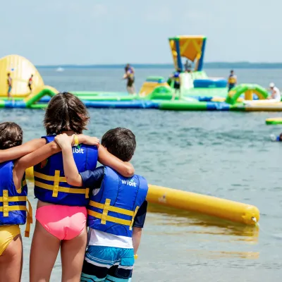 a group of people on a boat in the water