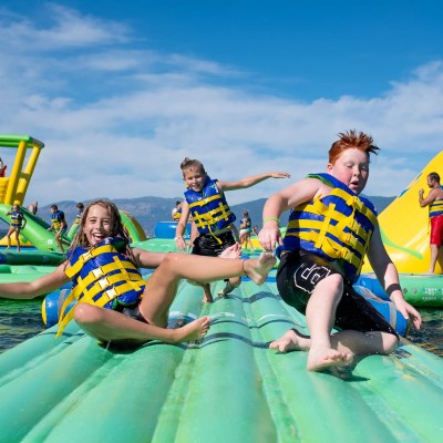 a group of people in a pool of water
